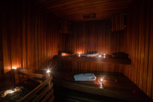 a room with a bed with lights on it at Hotel Palais Al Bahja in Marrakech