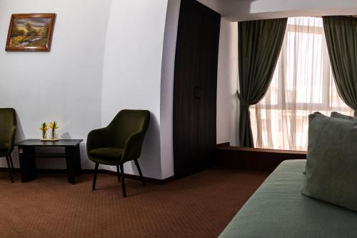 Posezení v ubytování HOTEL CORA Bistrita