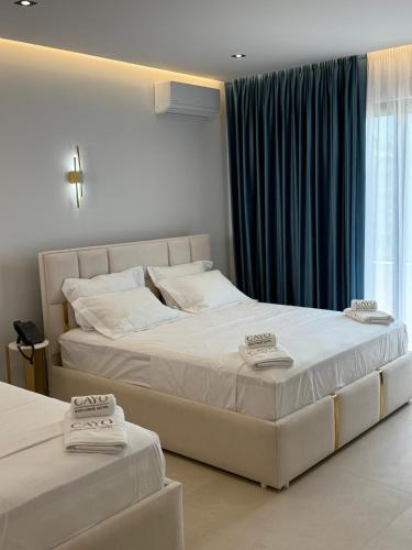 Cayo Exclusive Hotelにあるベッド