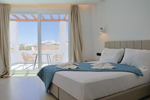 Katil atau katil-katil dalam bilik di The Blue of Mykonos