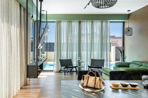a living room with a couch and a table at Villa Restart Vrsi-Mulo in Vrsi