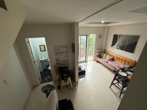 an overhead view of a living room with a couch at Sojourn 2600 in Baguio