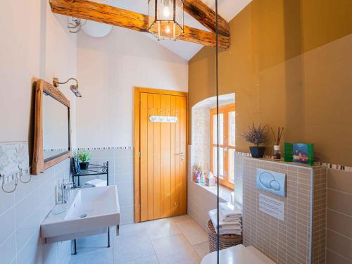 a bathroom with a sink and a mirror at Holiday home in Tinjan - Istrien 52053 in Tinjan