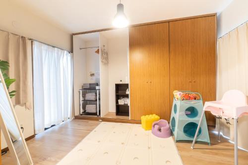 Cama o camas de una habitación en 名古屋市北区楠民泊