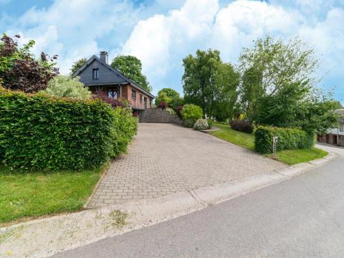 a cobblestone street in front of a house at Charming cottage in heart of the Ardennes in Lierneux