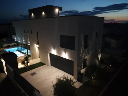 an aerial view of a building at night at Villa Restart Vrsi-Mulo in Vrsi