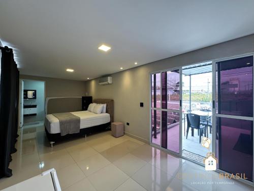 Ένα ή περισσότερα κρεβάτια σε δωμάτιο στο Apartamento com Vista nas alturas e Área de Lazer