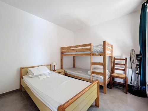 Posteľ alebo postele v izbe v ubytovaní Villa plain pied 7 pers., jardin, parking, à 10 min plage - Palavas - FR-1-715-50