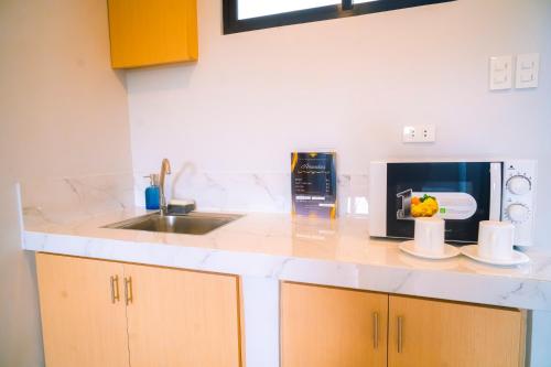 Η κουζίνα ή μικρή κουζίνα στο The Grounds Hotel