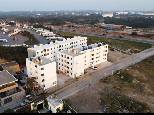 an aerial view of two white buildings and a street at Departamento "Mar & Descanso" in Ciudad Madero