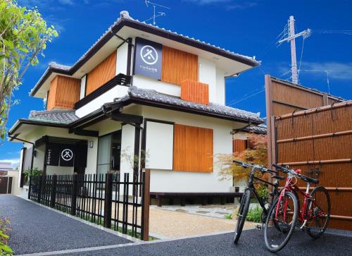 a house with a bike parked in front of it at Ikoma-gun - House - Vacation STAY 4520 in Koizumi