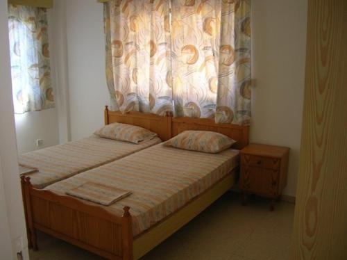 Katil atau katil-katil dalam bilik di Marios Apartments