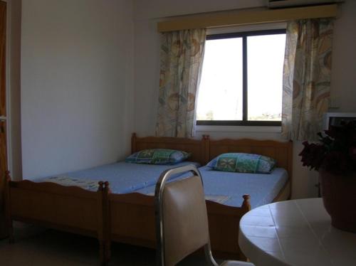 Katil atau katil-katil dalam bilik di Marios Apartments