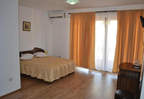 Postel nebo postele na pokoji v ubytování Hotel Corsar