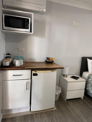Kuchyň nebo kuchyňský kout v ubytování Narimba Motel