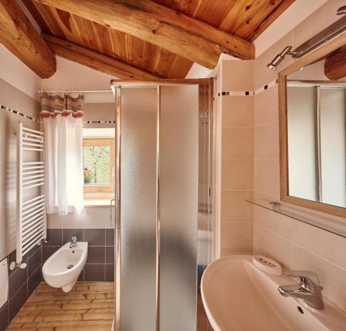Et badeværelse på Locanda Del Silenzio Residence