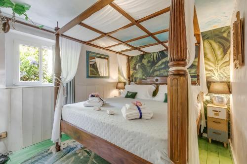 Giường trong phòng chung tại Casa Fra Gli Ulivi Apartments with Shared Pool
