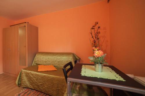 Ένα ή περισσότερα κρεβάτια σε δωμάτιο στο Apartment Tomašević