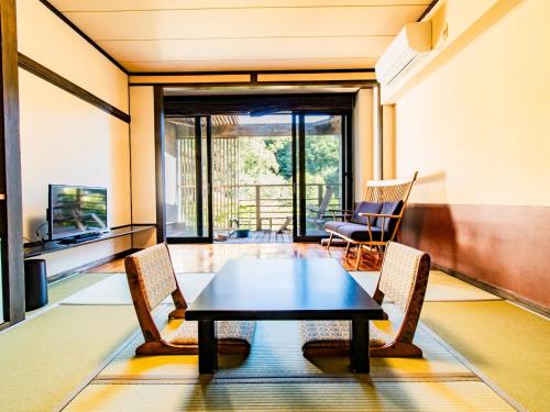 Televisyen dan/atau pusat hiburan di Kirishima Momijidani Seiryuso - Vacation STAY 63048v