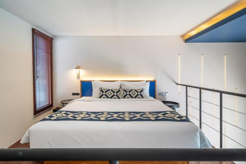 Ένα ή περισσότερα κρεβάτια σε δωμάτιο στο First 5 Loft
