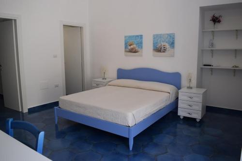 Ένα ή περισσότερα κρεβάτια σε δωμάτιο στο La Casa di Cirro