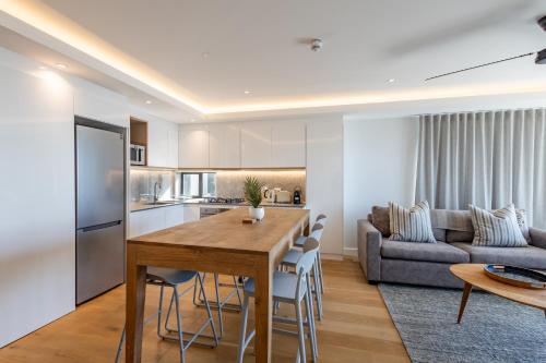 Η κουζίνα ή μικρή κουζίνα στο Plett Quarter Apartments