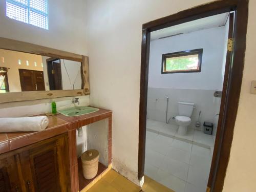 Koupelna v ubytování Hakiki Inn Bungalows