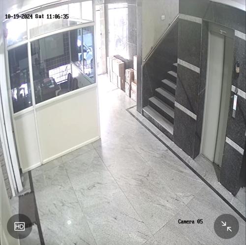 an empty room with a staircase in a building at 2BHK penthouse Majestic Heights in Hyderabad