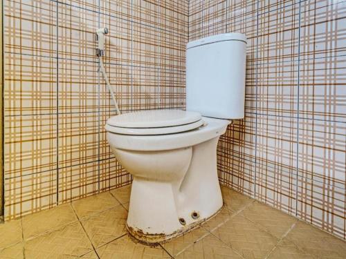 Ванная комната в Hotel O Artana Bed and Breakfast.NearSitu Cileunca