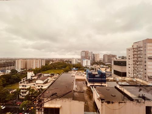an aerial view of a city with tall buildings at Hotel Senses in Kolkata