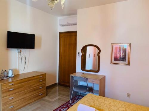 TV a/nebo společenská místnost v ubytování VENICE NIGHT APPARTMENT