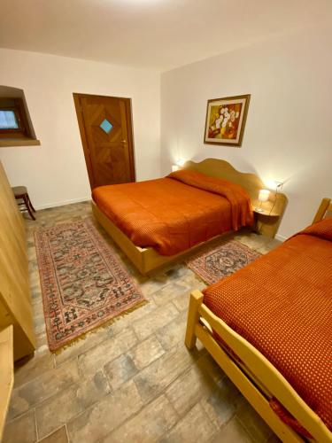 Katil atau katil-katil dalam bilik di AGRITURISMO FARE BIO