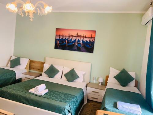 Ένα ή περισσότερα κρεβάτια σε δωμάτιο στο VENICE NIGHT APPARTMENT