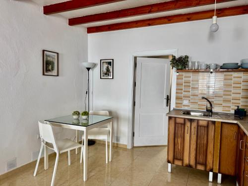 Η κουζίνα ή μικρή κουζίνα στο Apartamento Lava by Vulcano Homes