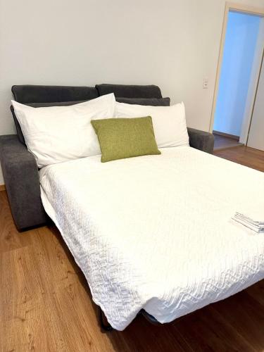 Ένα ή περισσότερα κρεβάτια σε δωμάτιο στο Appartamento Tre Torri - in pieno centro città