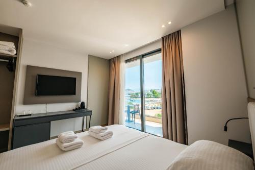 Ένα ή περισσότερα κρεβάτια σε δωμάτιο στο Hotel Boutique Onix