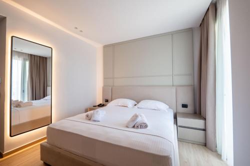 Ένα ή περισσότερα κρεβάτια σε δωμάτιο στο Hotel Boutique Onix