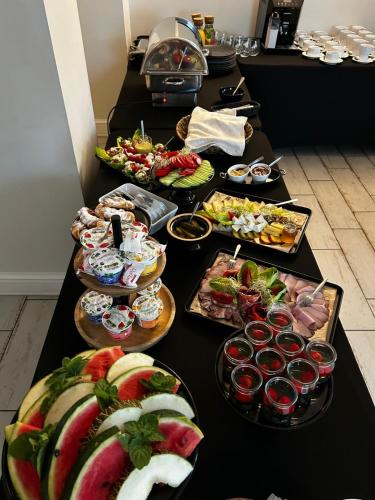 a buffet line with many different types of food at Pokoje gościnne Restauracja u Kusia in Mikołów