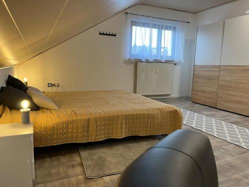 Postel nebo postele na pokoji v ubytování Ferienwohnung Stark - Heidenrod