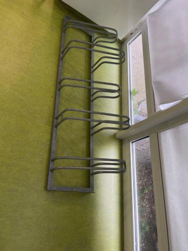 a metal fire escape on the side of a building at Penzion Andy in Děčín