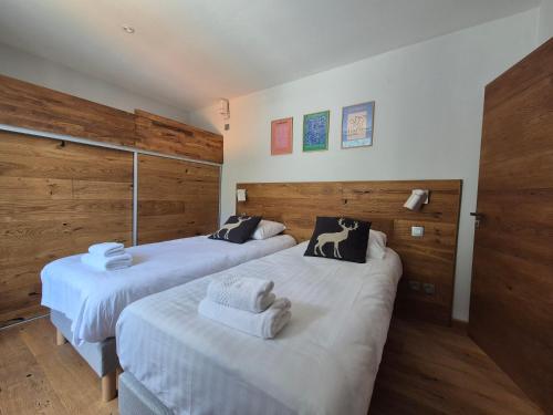 Postel nebo postele na pokoji v ubytování Magnifique Appartement au Centre de Chamonix