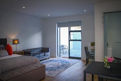 Χώρος καθιστικού στο Upmarket Room