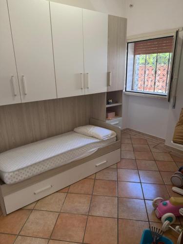 Katil atau katil-katil dalam bilik di Casa vacanza privata