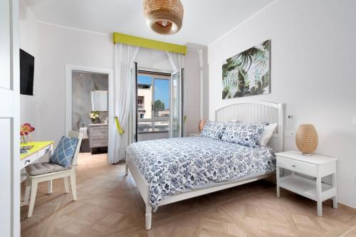 Ένα ή περισσότερα κρεβάτια σε δωμάτιο στο Verde Smeraldo-Pompei