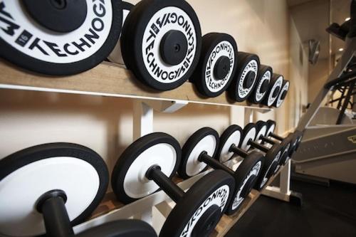 a row of black and white tires on a shelf at Malmaison Newcastle in Newcastle upon Tyne