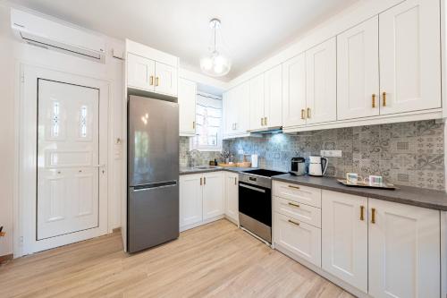Η κουζίνα ή μικρή κουζίνα στο Garden View Apartment Poseidonas