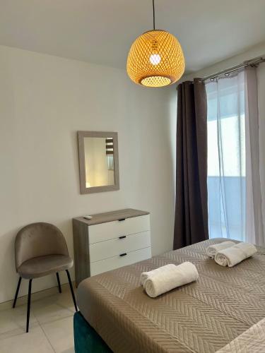 Sea View Modern Apartmentにあるベッド