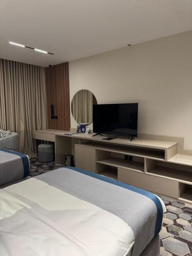 Katil atau katil-katil dalam bilik di Continent Al Waha Hotel Riyad
