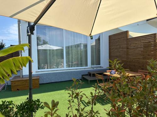 Jardin de l'établissement Blue Velvet Rooms