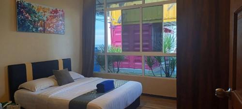 Papar Beachfront Viewにあるベッド